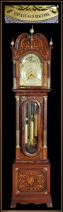 Handsome early 20th century Tiffany marquetry inlaid grandfather clock, 8 feet 7 inches tall. Historical Estates Auctions image